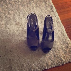 Barely worn platform heels w/ strap.